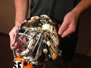Illustration for article titled Steve Mason's Goalie Mask Features Zombified American Patriots
